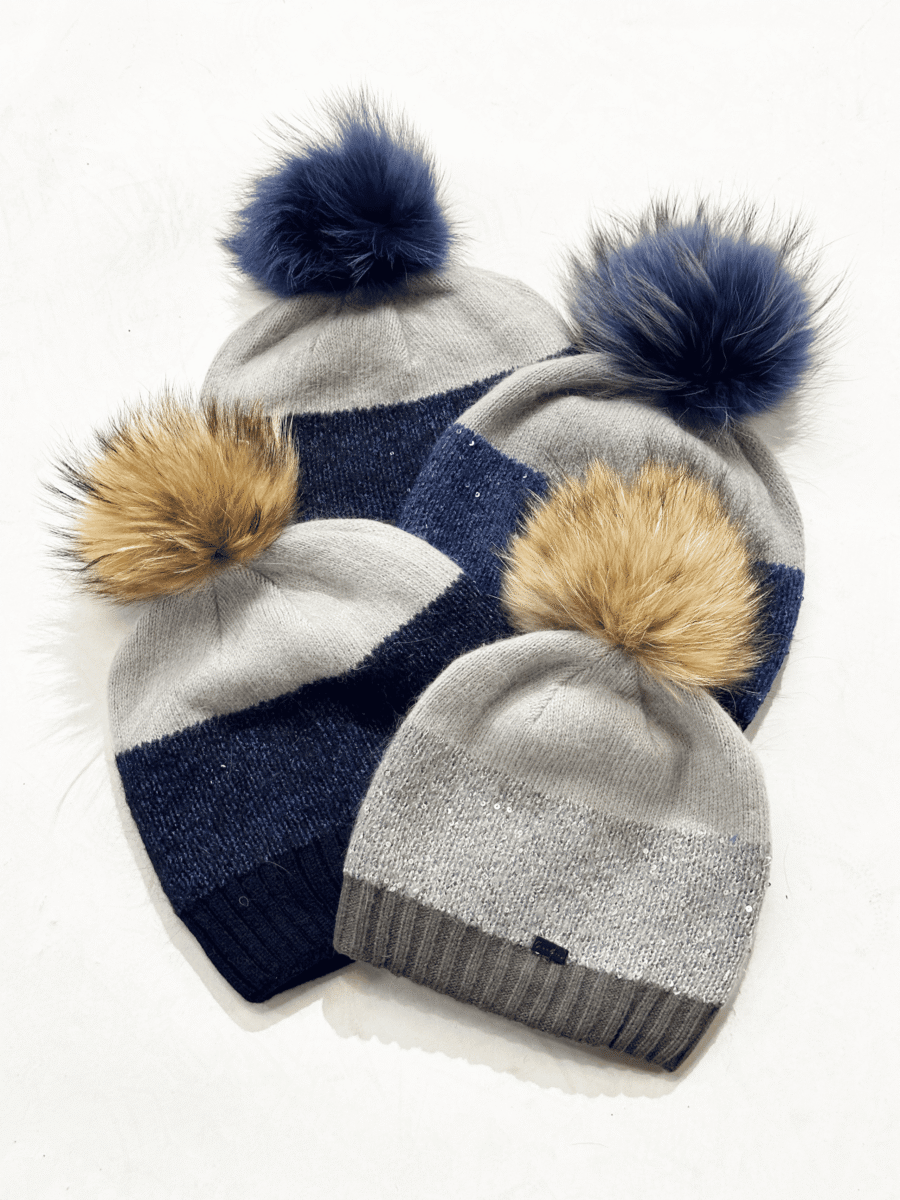 Hat with fur tassel and glitter